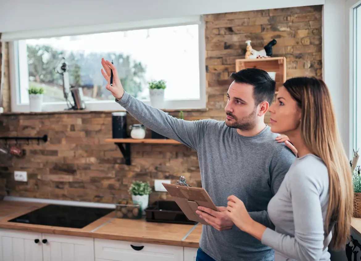 A couple planning kitchen remodeling