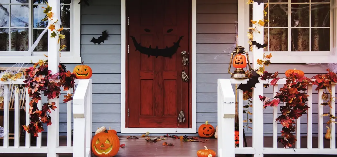 House front porch decorated with Halloween decors