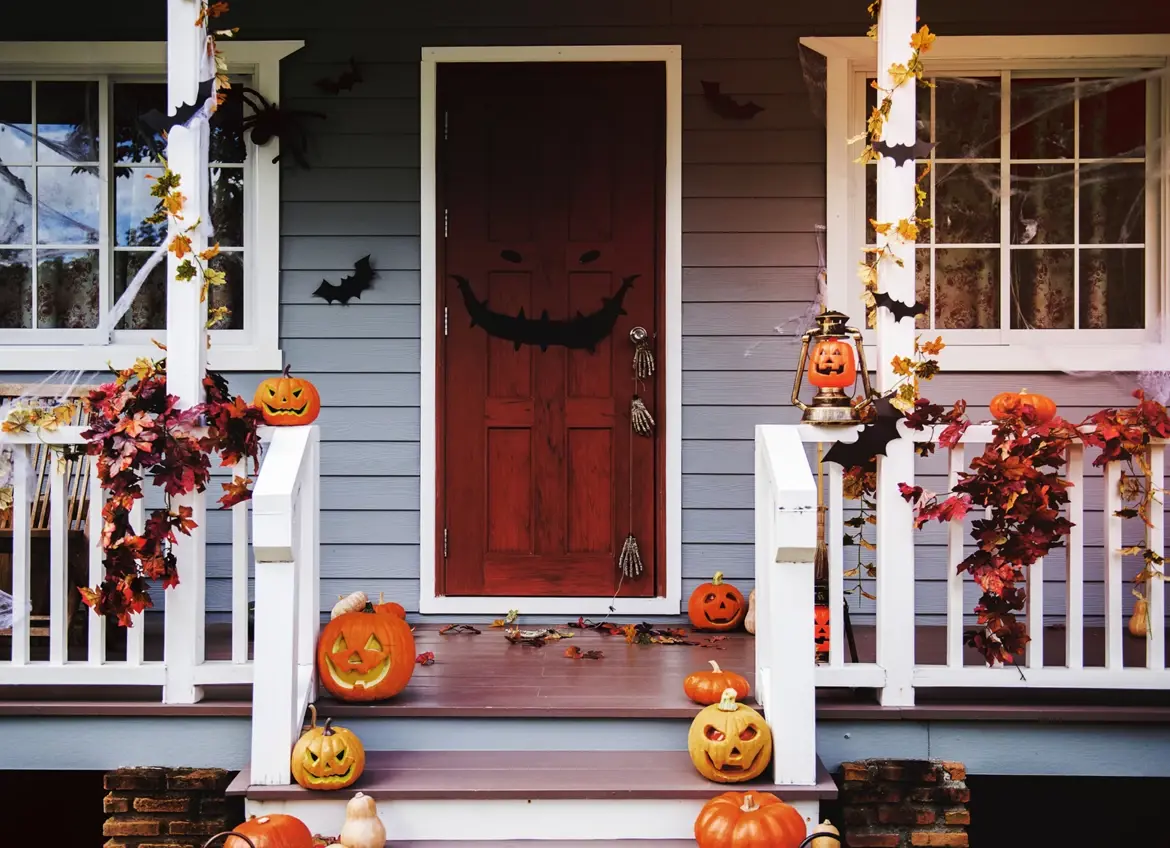 House front porch decorated with Halloween decors