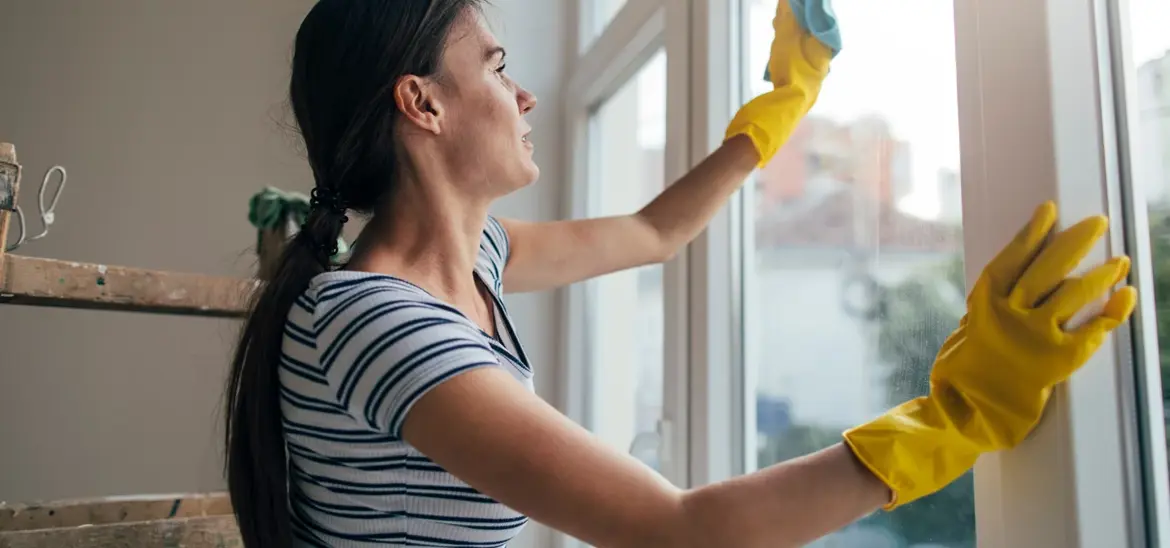 Woman cleaning windows