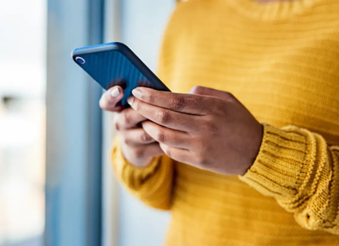 a woman texting on her phone