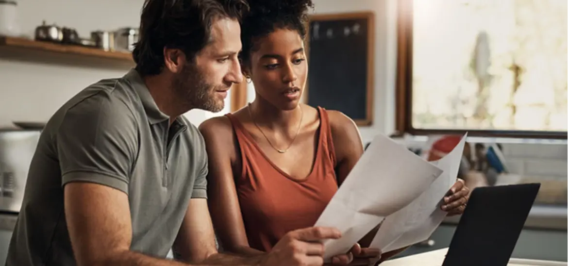 A couple reviewing paperwork together