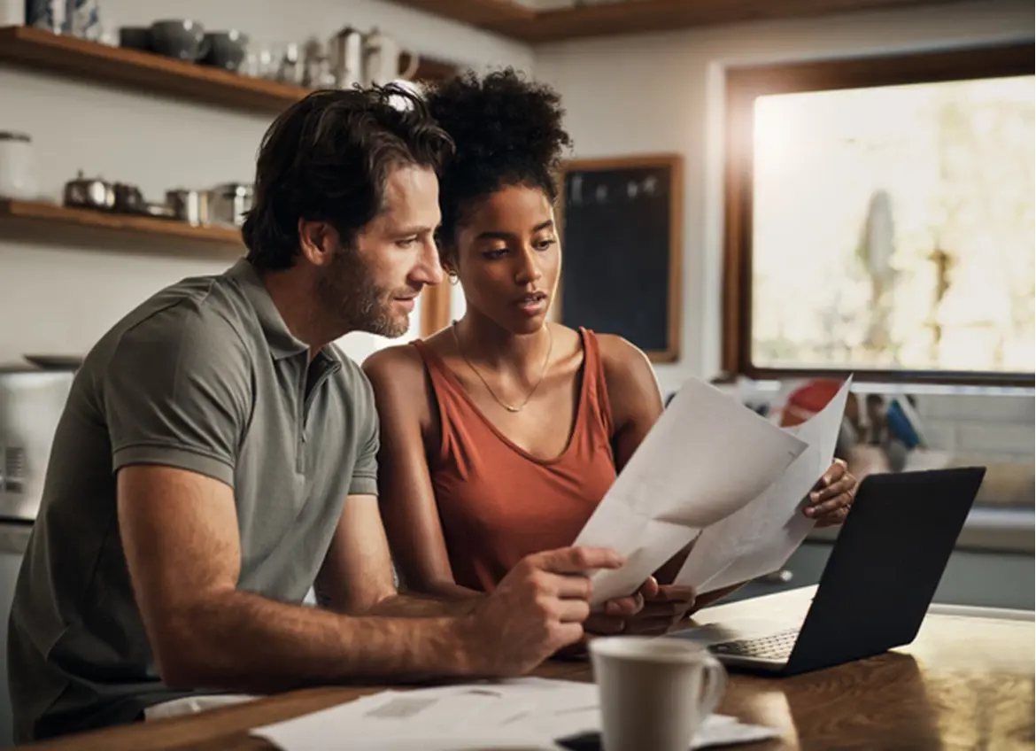 A couple reviewing paperwork together